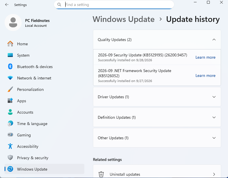 Windows 11 25H2 Update history showing installed quality and driver update sections