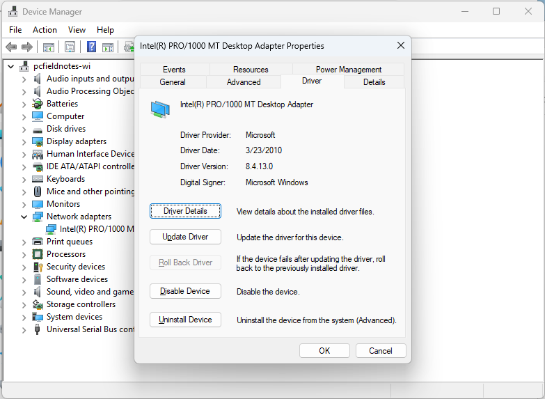 Windows 11 Device Manager network adapter Driver tab with Roll Back Driver unavailable